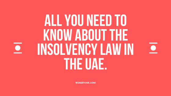 Close-up of legal documents and gavel on a desk representing insolvency proceedings in the UAE