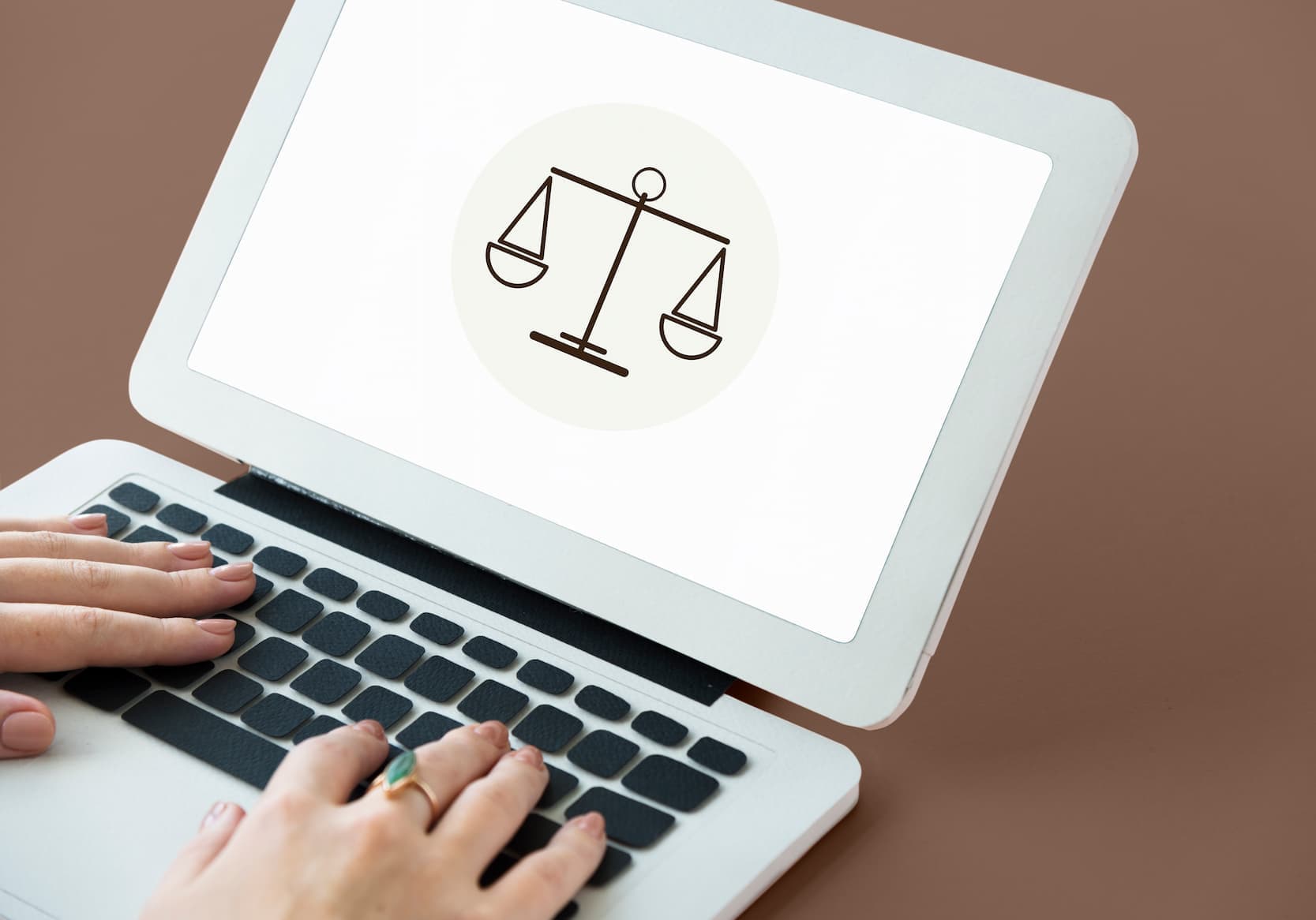 Close-up of a computer screen displaying a UAE court case inquiry portal with a case number search field and results page